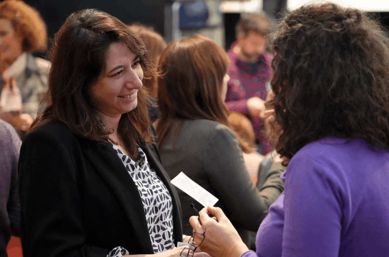 Team members in conversation during a Timescaping session